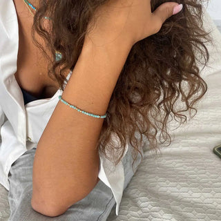 Milos Gemstone and Gold Bead Bracelet with malachite beads on wrist, handcrafted adjustable length, 22k gold on recycled brass