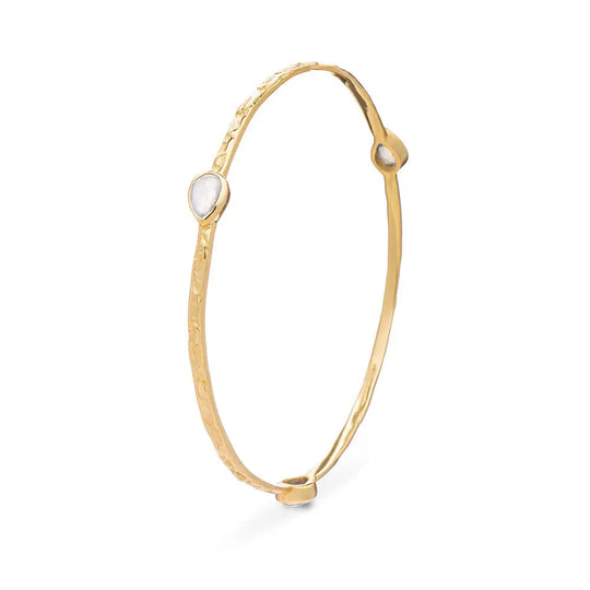 Simi Three Stone Stacking Bangle featuring 22kt gold plated brass with three teardrop rainbow moonstones and textured finish