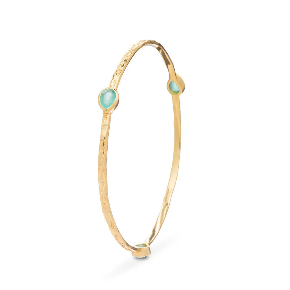 Simi Three Stone stacking bangle with Paraiba Onyx in 22kt gold on recycled brass, 70mm diameter, handcrafted textured design
