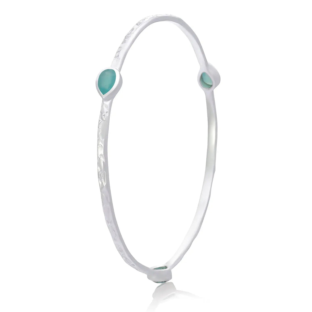 Simi Three Stone Stacking Bangle in sterling silver with three aqua Paraiba Onyx gemstones and textured design