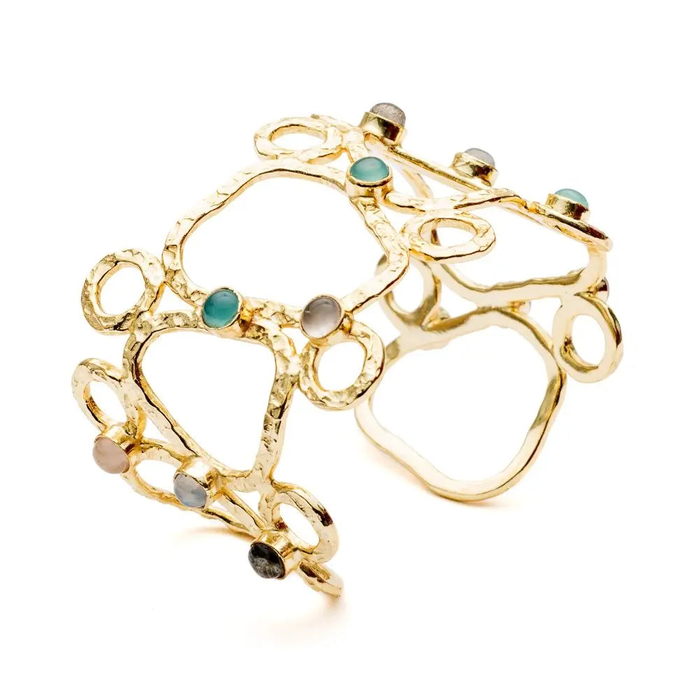Thalia Sculptural Cuff in 22k gold with rose quartz, moonstone, labradorite, and pariba onyx stones, adjustable luxury bracelet