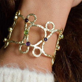 Thalia Sculptural Cuff handcrafted gold brass bracelet with rose quartz, moonstone, labradorite, and pariba onyx stones on wrist