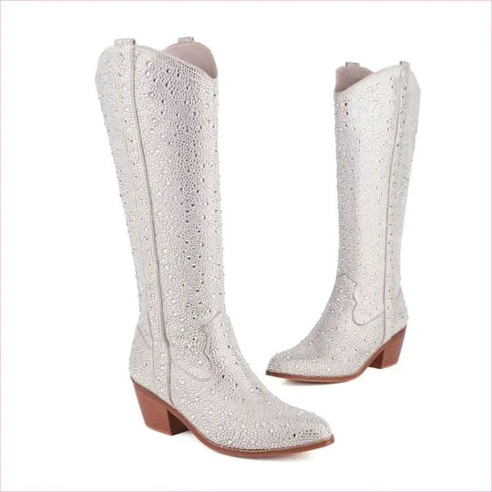 Pair of beautiful rhinestone pointed toe western boots with mid-height brown heels and white embellished upper