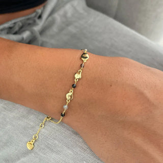 Sofia Nugget Bracelet with black onyx, smoky quartz, labradorite and 22k gold beads on wrist