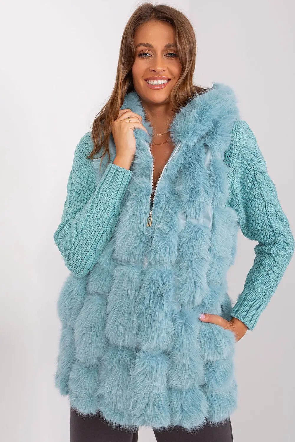 Elegant women's hooded faux fur vest in light blue with zipper and pockets