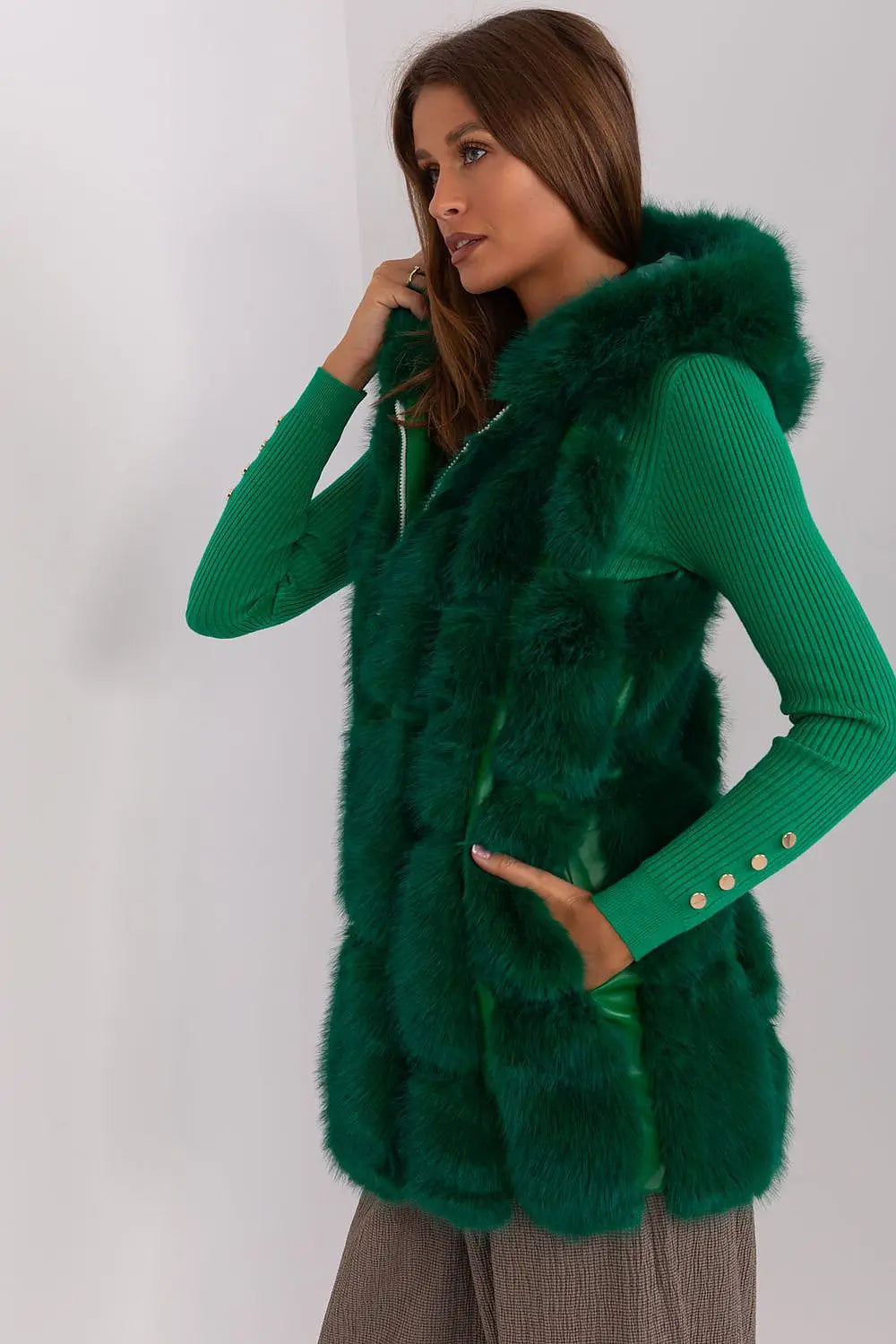 Elegant women's hooded faux fur vest in green polyester with pockets and zipper closure