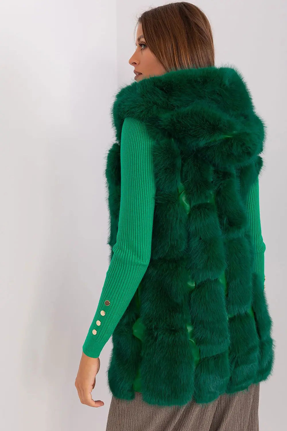 Elegant green women's hooded faux fur vest made of soft polyester with pockets and zipper closure