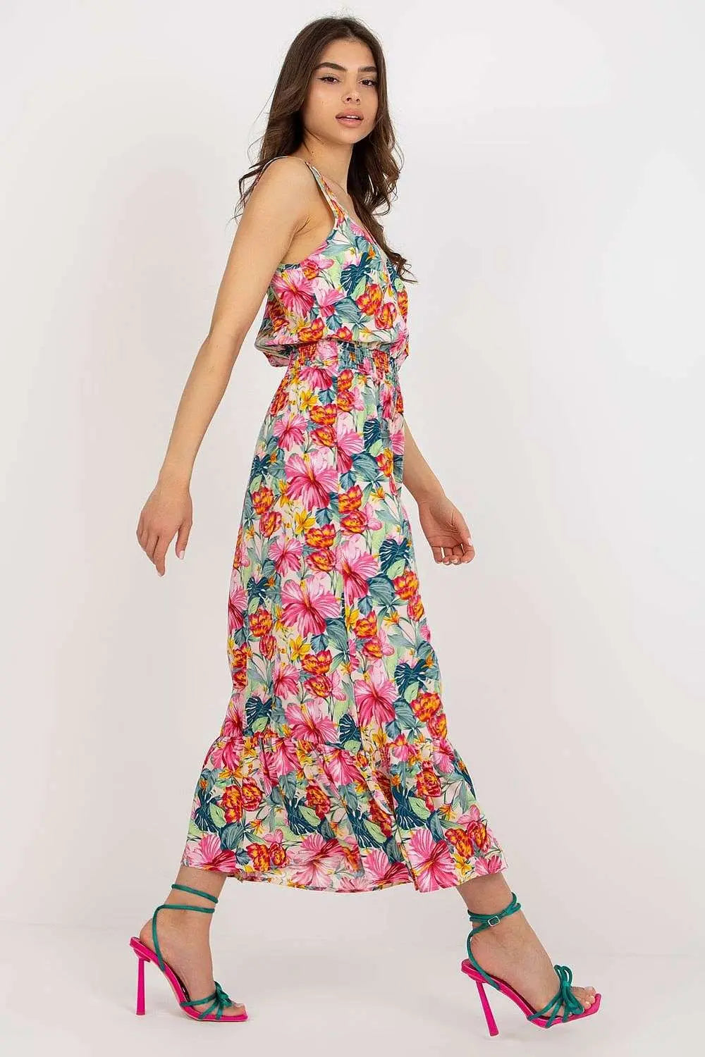 Summer floral dress with heart neckline and ruffle hem.