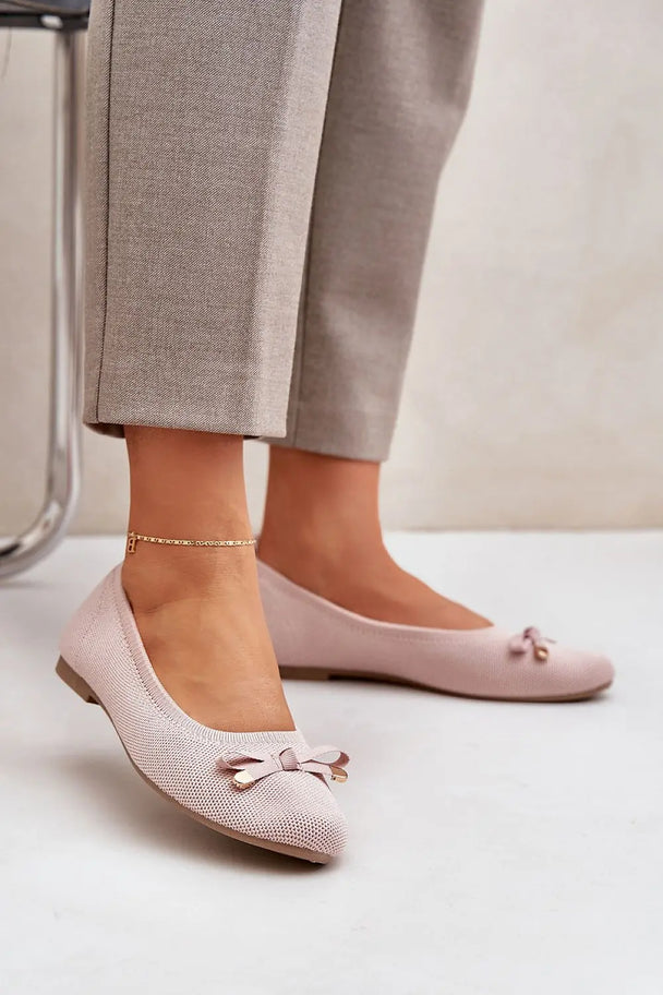 Pink ballerinas with mesh material, subtle front bow, and eco-leather insole, perfect for everyday and formal occasions.