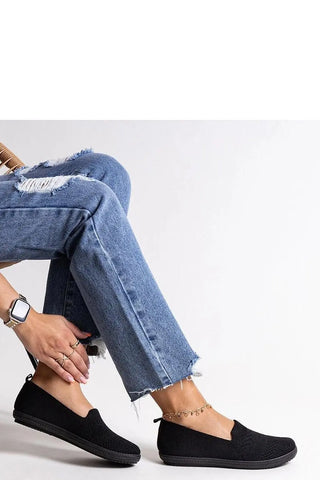 Black slip-on sneakers