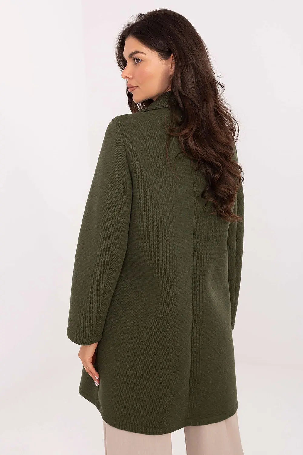 Elegant women's transitional coat in olive green with lapels and brooch detail, made from polyester blend fabric.