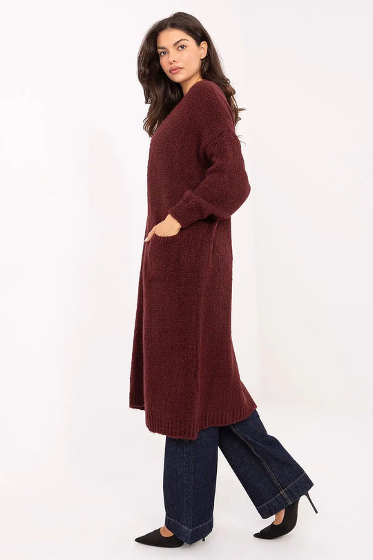 Long women's cardigan in burgundy with long sleeves and slip pockets, knee-length casual style.