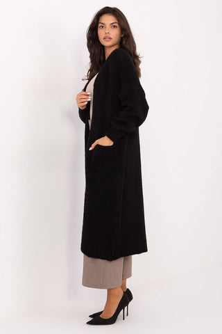 Long black women's cardigan with long sleeves and slip pockets, knee-length, casual style