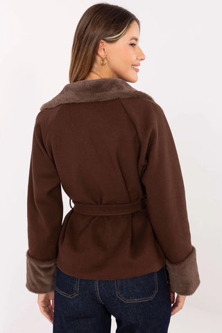 Elegant short women’s coat in brown with fur trim and belt shown from the back