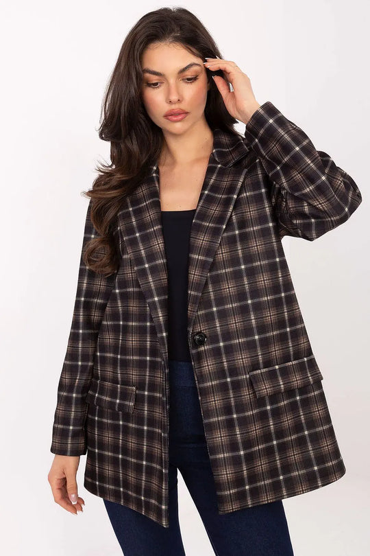 Women’s checked blazer in classic pattern with shoulder pads, buttoned up, styled for casual and elegant looks