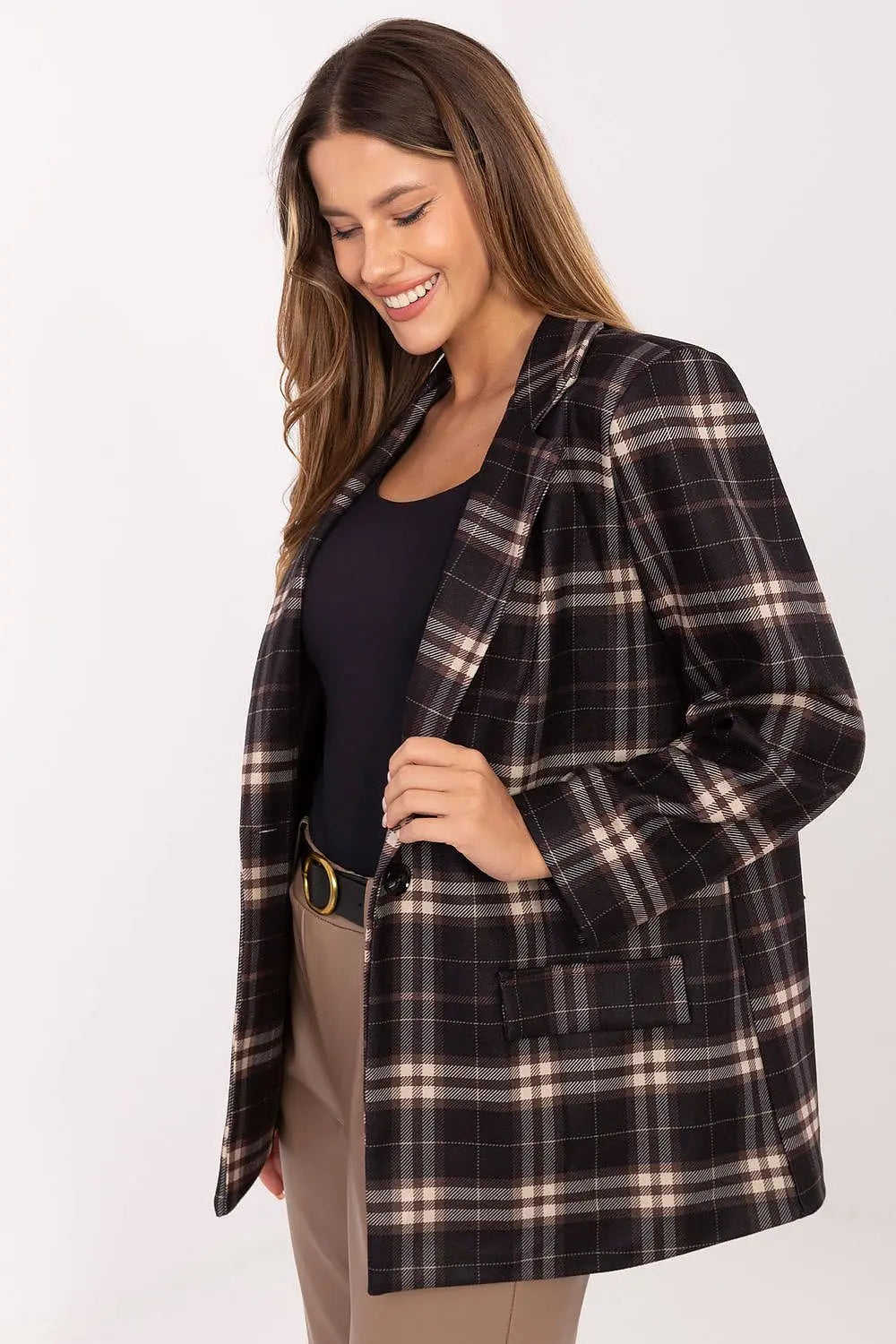 Woman wearing stylish modern women’s checked blazer with button closure and classic checkered pattern