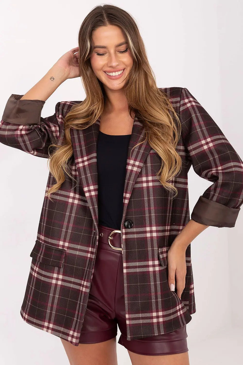 Women’s checked blazer in brown and burgundy with long sleeves and button closure