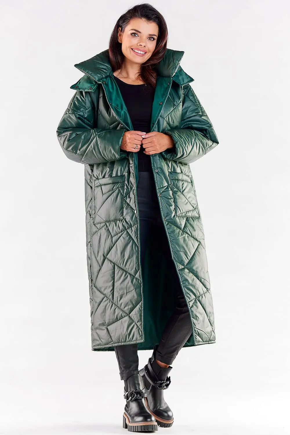Elegant long quilted coat for women with hood and large pockets, perfect for autumn and winter.