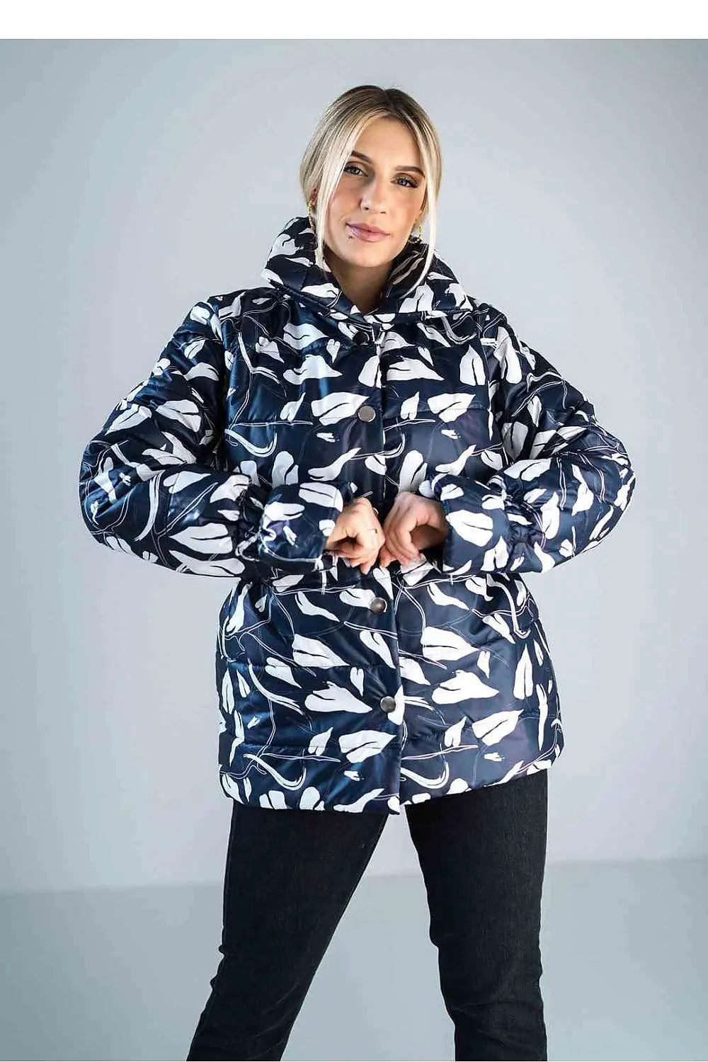 Women’s shiny quilted jacket with high collar and floral pattern