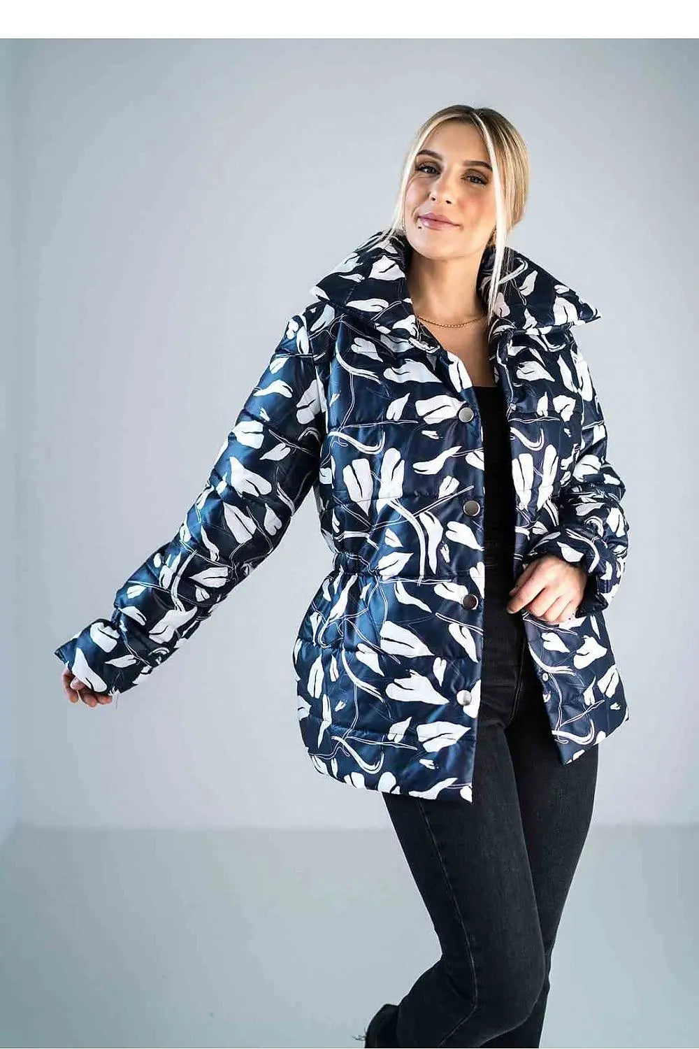 Women’s shiny quilted jacket with high collar and floral pattern, hip-length and insulated lining