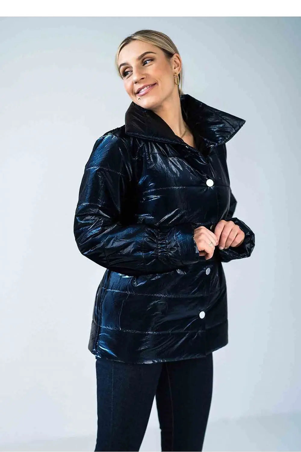 Women’s shiny quilted hip-length jacket with high collar and elastic cuffs in black polyester