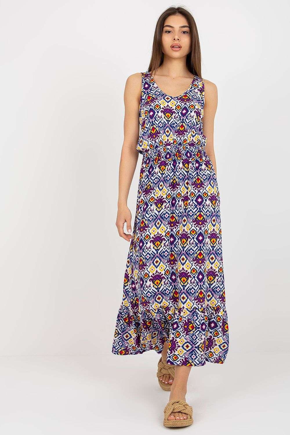 Summer floral dress with thick straps and heart neckline, featuring a ruffled bottom.