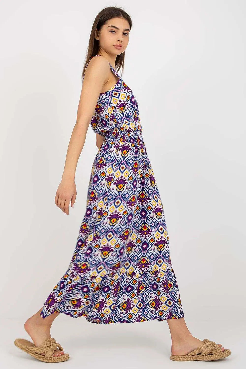 Summer floral dress with thicker straps, heart neckline, and ruffled hem.