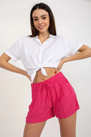 Women's pink shorts with elastic band and waist tie.