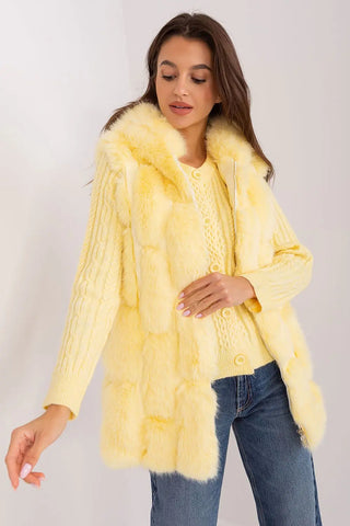 Elegant women's hooded faux fur vest in yellow polyester with pockets and zipper closure