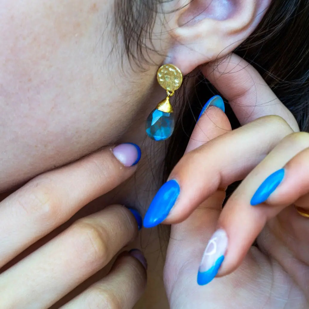 Classic Athena Drop Earrings with labradorite stone and 22k gold on recycled brass, worn on ear