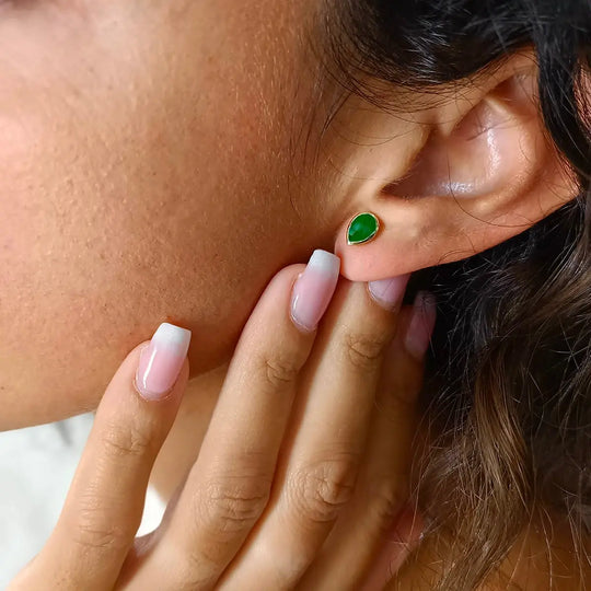 Simi Gemstone Studs handcrafted 22K gold green onyx teardrop earrings worn on ear