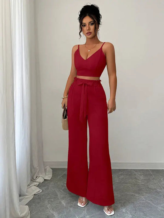Women's burgundy two-piece set with crop top and wide-leg pants