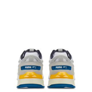 Rear view of Puma MIRAGE-SPORT Sneakers in white, grey, yellow, and blue with suede and mesh upper, rubber sole, and round toe design.
