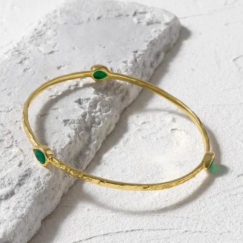 Simi Three Stone Stacking Bangle with green onyx gemstones in 22kt gold plated recycled brass, 70mm diameter, handcrafted artisan jewelry.