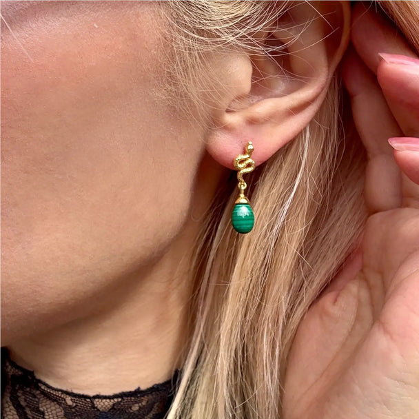 Medusa Small Gemstone Drop Earrings with 22K gold snake design and green malachite stone worn on ear