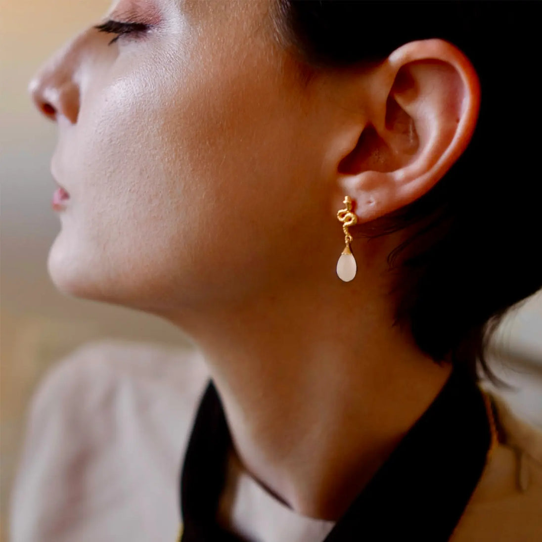 Medusa Small Gemstone Drop Earrings with white agate and 22K gold on recycled brass worn on ear