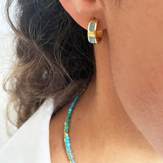 Cora Chunky Huggie Hoops gold earrings with green onyx gemstone, 15mm diameter, worn on ear